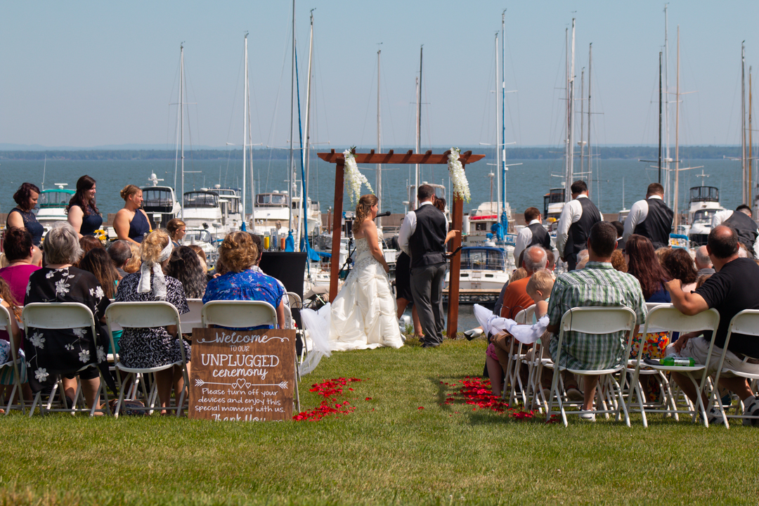 wedding ceremony on the lawn of Harbor View